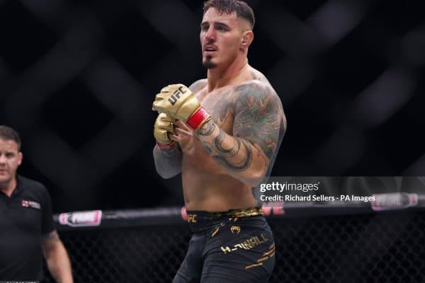 Том Аспиналлга рақиб торилди. Бу Жон Жонс эмас!