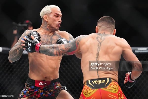 Чарльз Оливейра: “Илия Топурия январда жанг қилади”