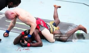 Исраэль Адесанья "тахтдан қулади", Алекса Грассо эса супер финиш билан ғалаба қозонди