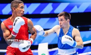 Ҳасанбой Дўсматов кубалик рақибини қай тарзда мағлуб этди (фотогалерея)