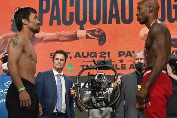 Мэнни Пакьяо ва Йорденис Угас вазн ўлчаш ҳамда "face-to-face" маросимида иштирок этди. Эртага жангни қандай кўриш мумкин? (Фотогалерея) 