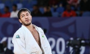 Uzbekistan's Sharafuddin Lutfillaev claim a silver medal at the World Judo Championships